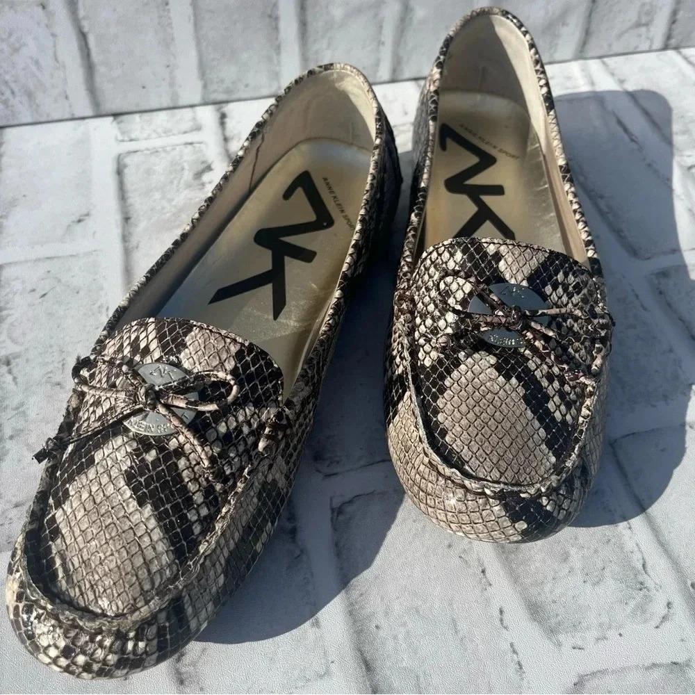 Anne Klein Sport. Snake print flats with bow accent. Size: 9M. Billy Jean style